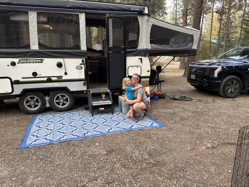 The family sets up to camp in the Lolo National Forest.